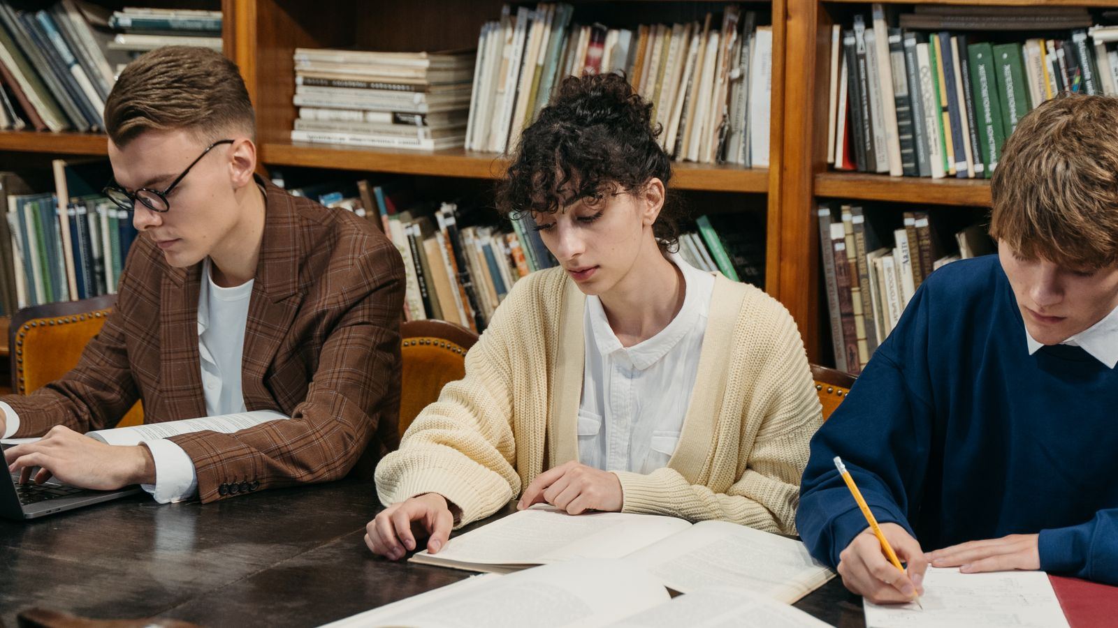 Students studying together at a library table